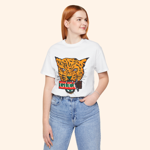 Mid-size model wearing All Mine Street Style Graphic Tee in white with bold orange tiger print, casual streetwear look with denim jeans