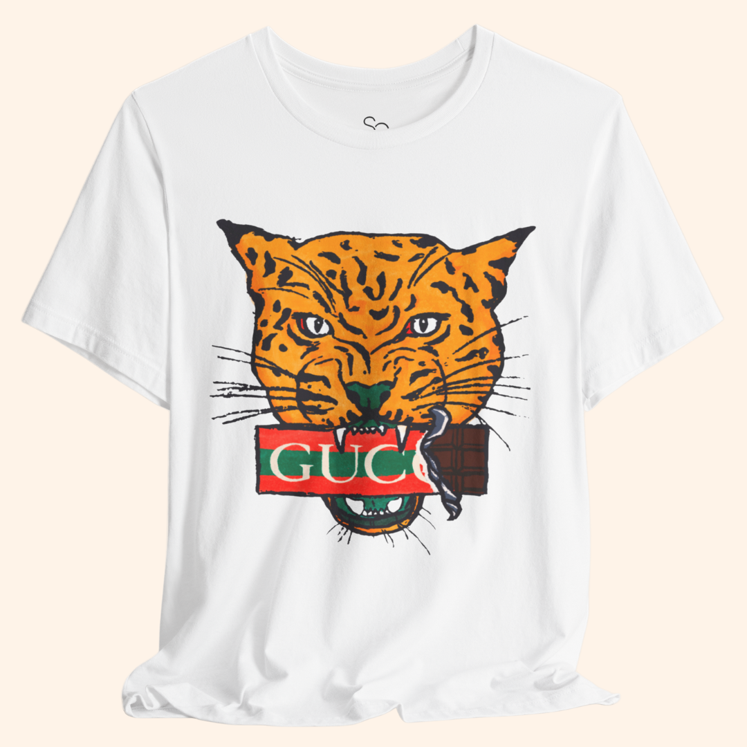 Close-up of All Mine Street Style Graphic Tee showing bold orange tiger artwork on soft white cotton shirt, modern streetwear fashion