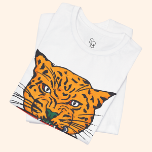 Folded All Mine Street Style Graphic Tee – close-up of bold orange tiger print on soft white cotton shirt, minimalist streetwear detail
