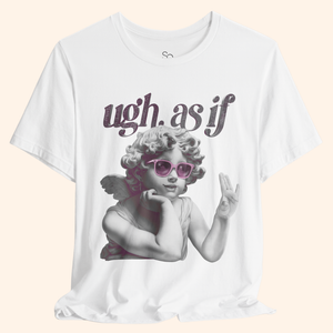 Close-up of white graphic tee with “ugh. as if” text and angel wearing pink sunglasses. Focus on detailed print and soft cotton texture.