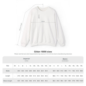 Heather gray unisex crewneck sweatshirt shown with measurements for width, length, and sleeve length. Includes Gildan 18000 sizing chart in imperial and metric with sizes S to 5XL. Clear visual layout to help buyers choose the right fit for this holiday graphic pullover.