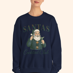 Close up of navy holiday sweatshirt showcasing detailed vintage Santa artwork, plaid Santas text, and cocktail illustration, highlighting print quality and fleece texture.