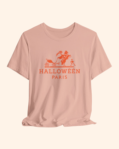 Peach Midnight in Paris graphic tee with coral-orange horse-drawn carriage artwork