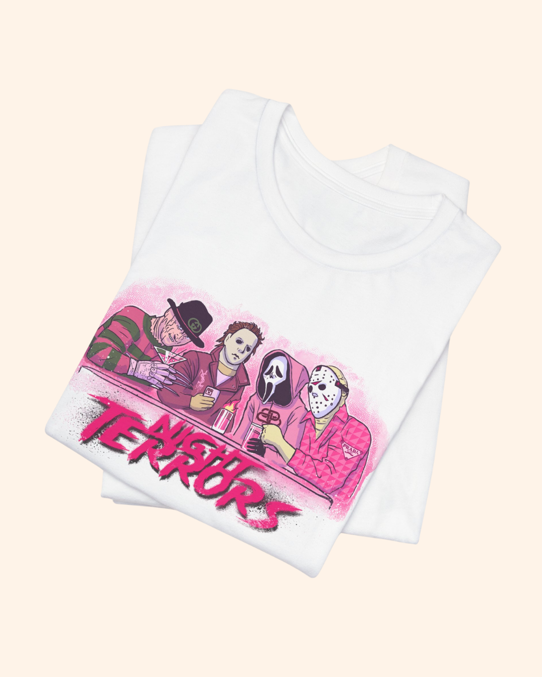 Folded white Night Terrors graphic tee showing the distressed pink collage design