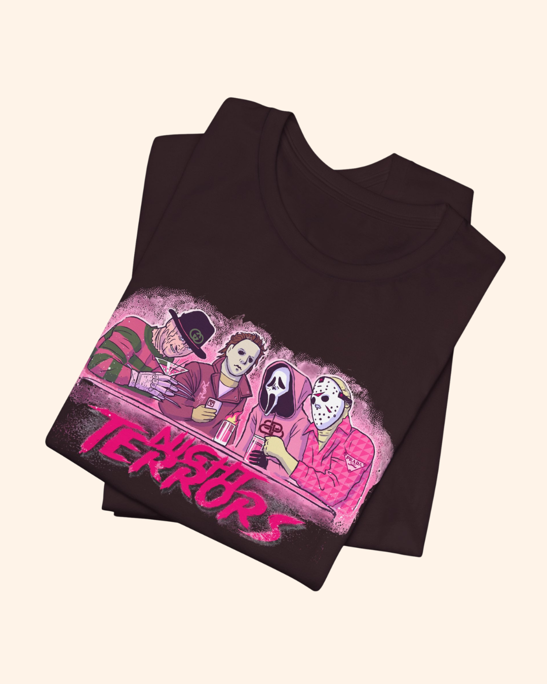 Folded Oxblood Black Night Terrors graphic tee with pink monochrome artwork