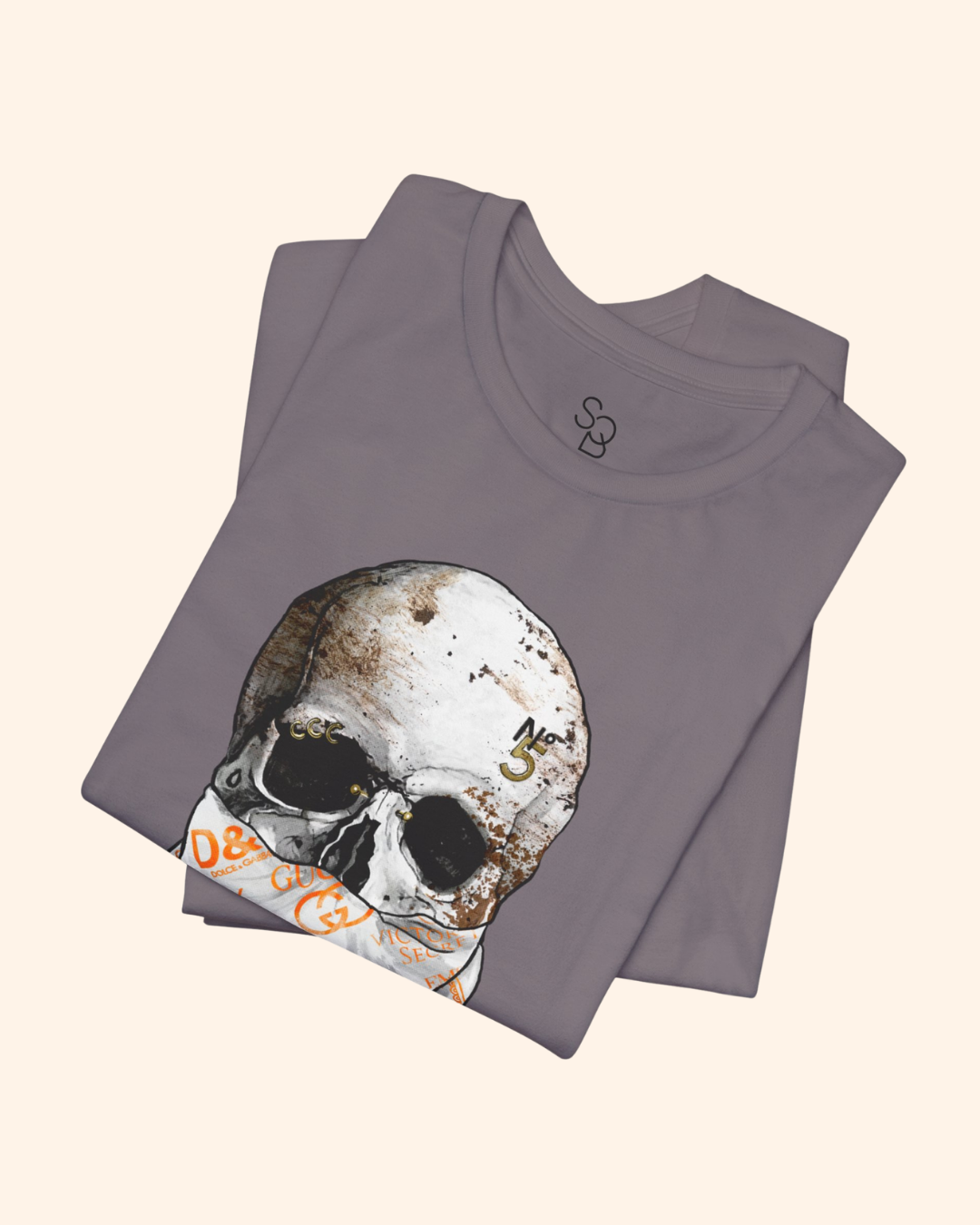 Folded Storm All or Nothing graphic tee showing the bandana skull design