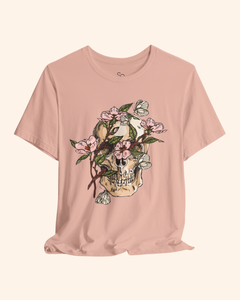 Peach Spring With You botanical skull graphic tee draped product mockup