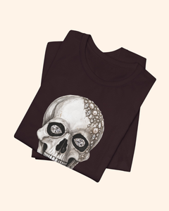 Folded Oxblood Black Shine Bright graphic tee with diamond-eye skull artwork
