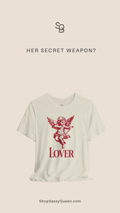 Product video showcasing natural colored Lover graphic t-shirt with red cherub cupid design styled with western accessories and casual outfit pieces