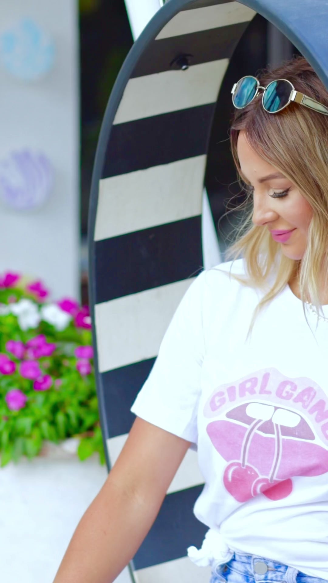 Video of Girl Gang graphic tee worn and styled by model, showing fit, cherry lips print, and best friend outfit inspiration.